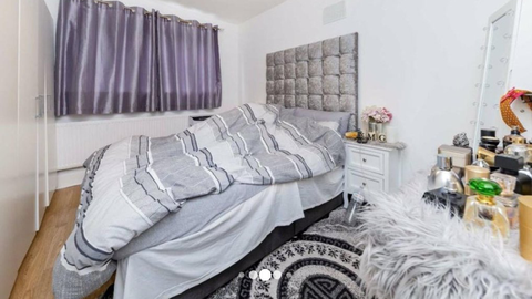Baffling bedroom photo sneaks into listing for two-bedroom flat in upmarket area of London.
