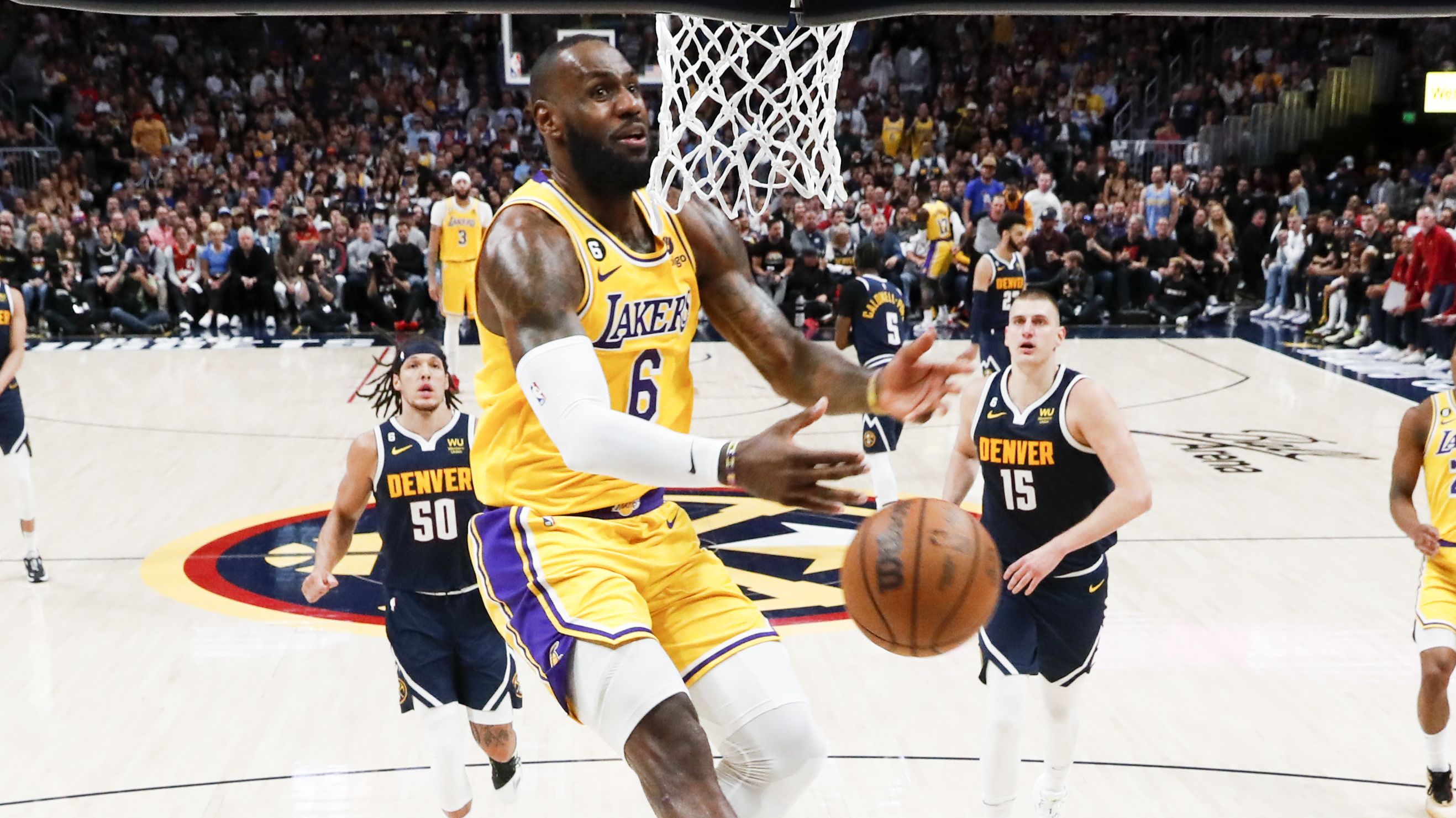 DENVER, CO - MAY 18: Los Angeles Lakers forward LeBron James loses handle of the ball while going up for a shot on a fast break during the first half of game two in the NBA Playoffs Western Conference Finals against the Denver Nuggets at Ball Arena on Thursday, May 18, 2023 in Denver, CO. (Robert Gauthier / Los Angeles Times)