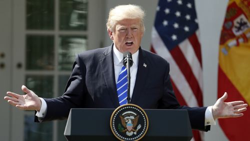  President Donald Trump speaks during a news conference with Spanish Prime Minister Mariano Rajoy in the Rose Garden of the White House.