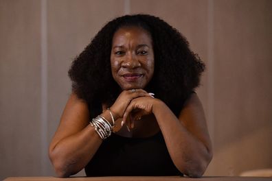 Me Too movement founder Tarana Burke poses at the National Press Club in Canberra in 2019.