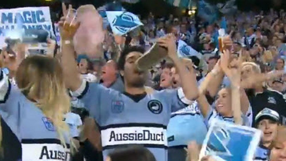 NRL: Sharks fan caught celebrating with a 'shoey'
