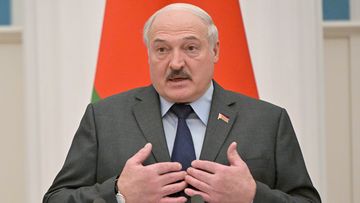Belarusian President Alexander Lukashenko gestures during a joint news conference with Russian President Vladimir Putin following their talks in the Kremlin in Moscow, Russia, Friday, Feb. 18, 2022. (