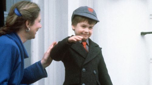 Prince William waving to onlookers after his first day at Wetherby School in Notting Hill Gate, London on January 15, 1987. (AAP)