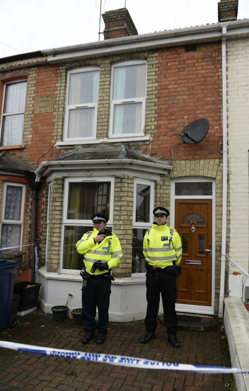 Police guard a home in High Wycombe linked to the arrests. (AAP)