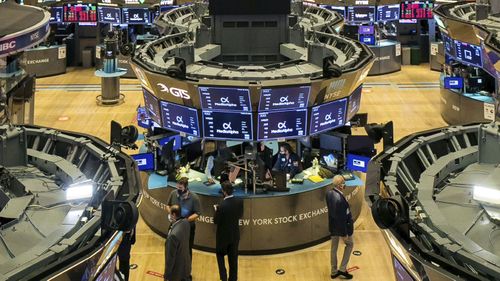 New York Stock Exchange, traders work on the floor during the MediaAlpha IPO, Wednesday Oct. 28, 2020