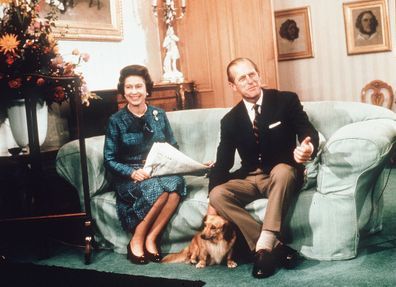 Queen Elizabeth and Prince Philip with their dogs