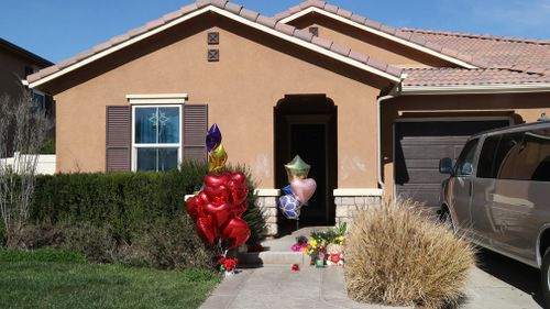 Flowers have been laid outside the Turpin's home. (AAP)