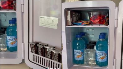 Mini fridge containing soft drinks and chocolate.