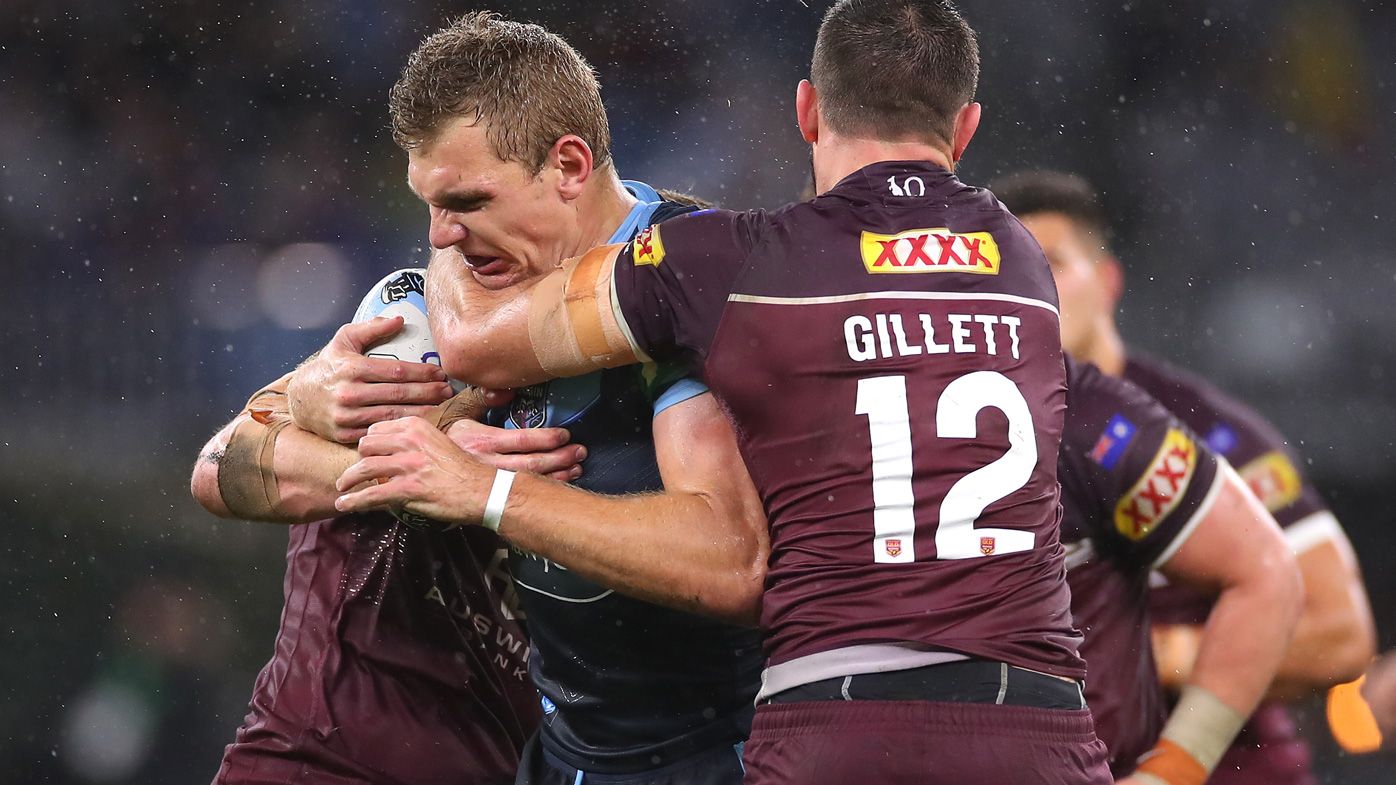 Tom Trbojevic of the Blues is tackled during game two of the 2019 State of Origin series between the New South Wales Blues and the Queensland Maroons