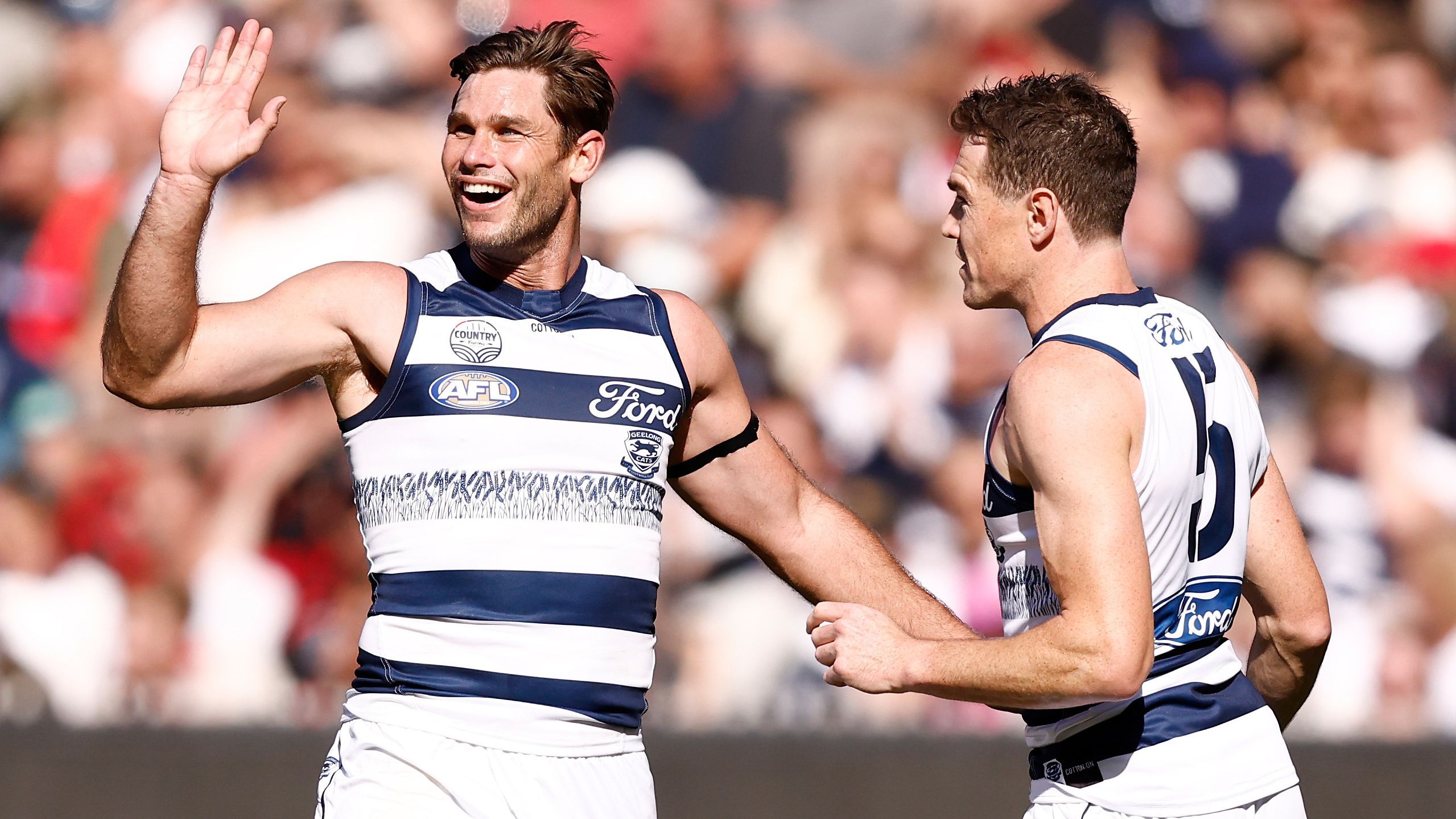 MELBOURNE, AUSTRALIA - APRIL 30: Tom Hawkins (left) and Jeremy Cameron of the Cats celebrate during the 2023 AFL Round 07 match between the Essendon Bombers and the Geelong Cats at the Melbourne Cricket Ground on April 30, 2023 in Melbourne, Australia. (Photo by Michael Willson/AFL Photos)