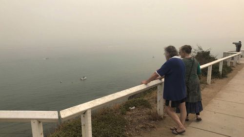 Smoke haze from bushfires is seen at Frankston Beach in Melbourne, Friday, January 3, 2020. 