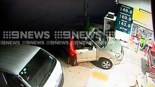 A man is seen looking inside the car to check if the keys are in the ignition before jumping in. Picture: 9NEWS