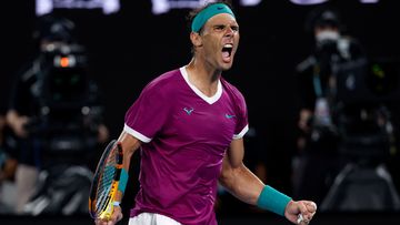 Rafael Nadal of Spain reacts after winning the third set against Daniil Medvedev of Russia during the men&#x27;s singles final at the Australian Open tennis championships in Melbourne, Australia, Sunday, Jan. 30, 2022. 