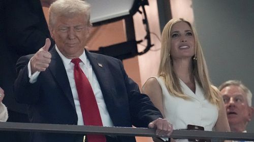 President Donald Trump stands with his daughter Ivanka Trump before the NFL Super Bowl 59 football game between the Kansas City Chiefs and the Philadelphia Eagles, Sunday, Feb. 9, 2025, in New Orleans.