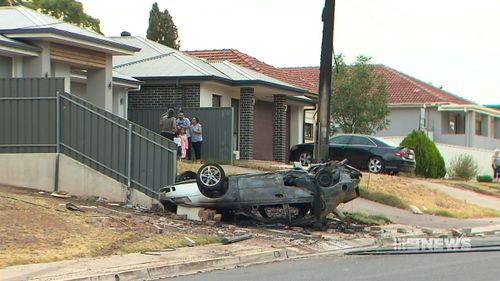 The Holden sedan was completely charred when emergency crews finally extinguished the flames.