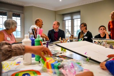 Prince William with Richard Baldwin in an art therapy session.