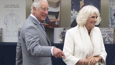 Prince Charles, Prince of Wales laughs during a visit with Camilla, Duchess of Cornwall to the Turnbull & Asser shirt factory on July 9, 2020 in Gloucester, United Kingdom