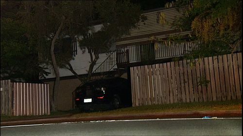 A Queensland man is fighting for life after being found at a home south of Brisbane with an alleged stab wound to the chest.