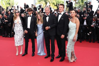 CANNES, FRANCE - MAY 19: (L-R) Lily Costner, Hayes Logan Costner, Grace Avery Costner, Kevin Costner, Cayden Wyatt Costner and Annie Costner attend the "Horizon: An American Saga" Red Carpet at the 77th annual Cannes Film Festival at Palais des Festivals on May 19, 2024 in Cannes, France. (Photo by Pascal Le Segretain/Getty Images)
