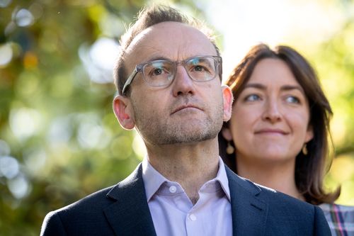 Adam Bandt, Leader of the Australian Greens and  Steph Hodgins-May, Greens Senator for Victoria updating the media on the likelihood that they will hold the balance of power in the Senate following Saturdays Federal Election.  They were in the Treasury Gardens, Melbourne. The Age. Picture:  Penny Stephens. Monday 5th May 2025