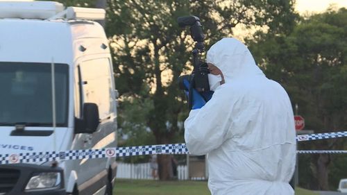 Forensic crews outside the Nowra home where Garry Welch was found dead. (9NEWS)