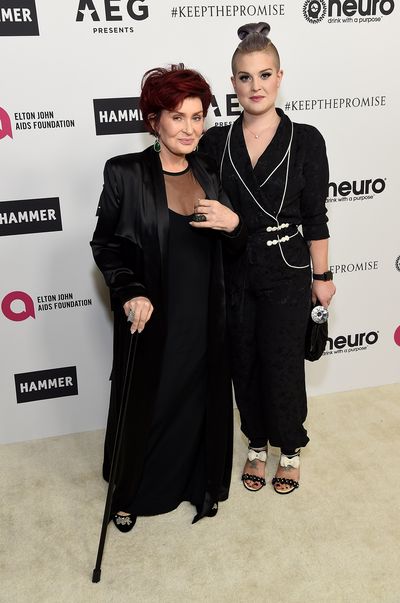 Sharon Osbourne brandished a cane with daughter Kelly.