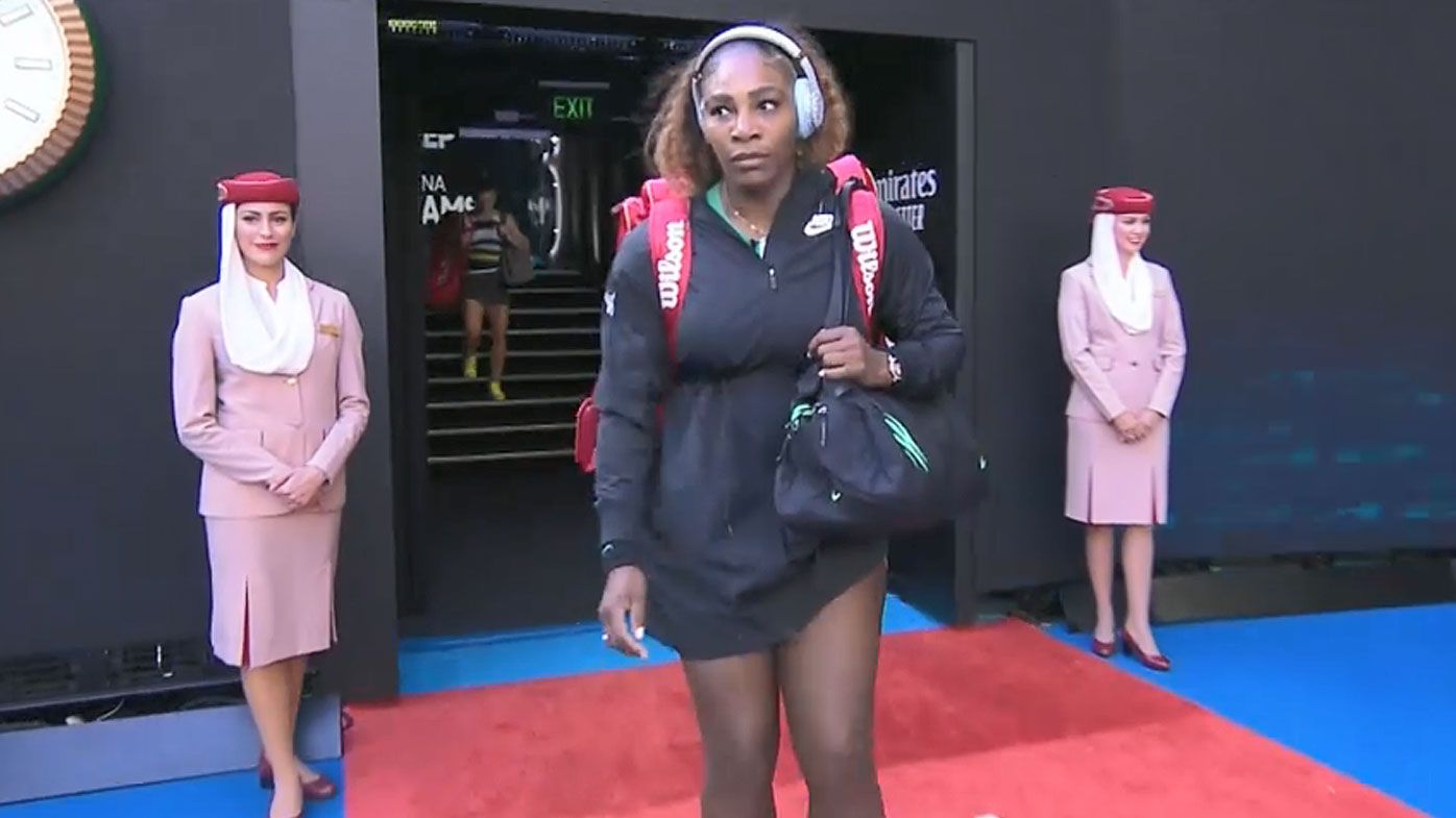 Serena Williams walks out on court