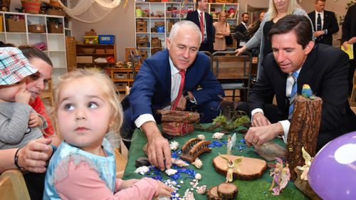 Prime Minister Malcolm Turnbull and Minister for Education Simon Birmingham visit a childcare centre. (AAP)