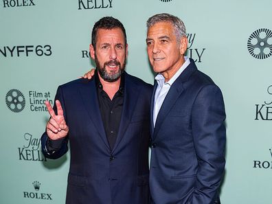 NEW YORK, NEW YORK - SEPTEMBER 29: Adam Sander (L) and George Clooney attend the "Jay Kelly" red carpet during 63rd New York Film Festival at Alice Tully Hall, Lincoln Center on September 29, 2025 in New York City. (Photo by TheStewartofNY/FilmMagic)