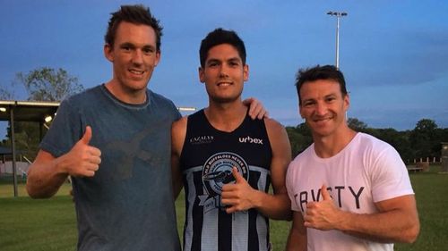 Martin-Page with former AFL players Drew Petrie and Brent Harvey.