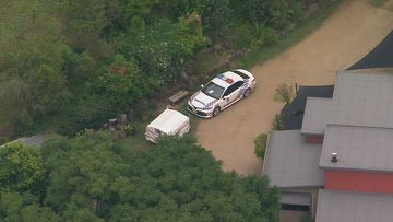 A young man who was found with critical head injuries at a property north of Brisbane had been partially buried alive