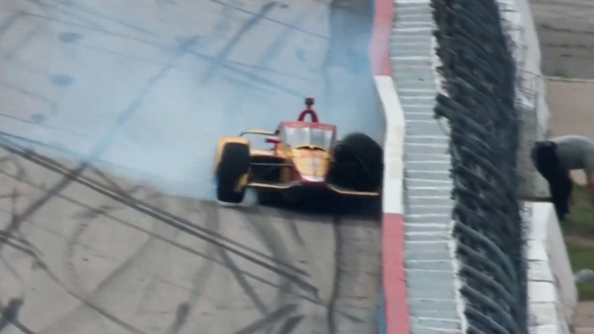 Romain Grosjean slams the inside wall after spinning out. 