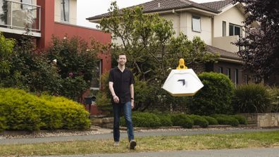 Drone food deliveries are suspended in the air for delivery