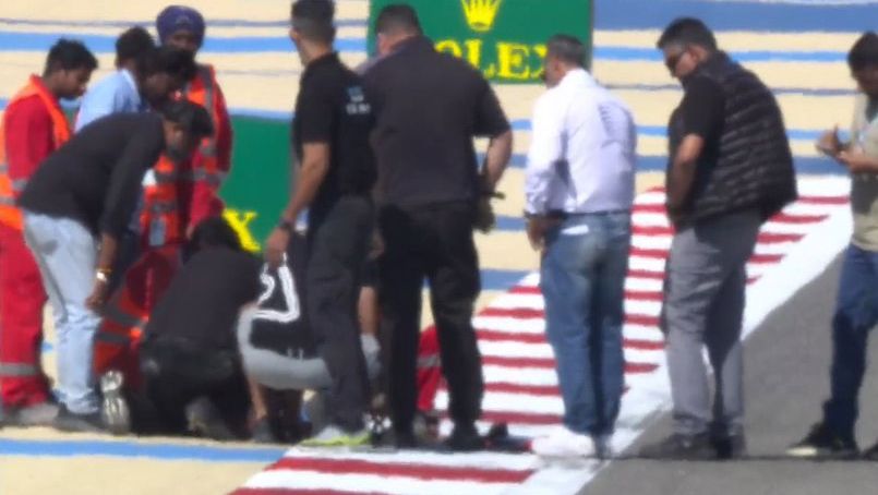 A loose drain cover on the Bahrain International Circuit brought the morning session of pre-season testing to a premature end.