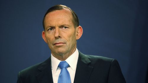 Prime Minister Tony Abbott has been labelled a "raving lunatic" by entertainer turned author, Russell Brand. (AAP)