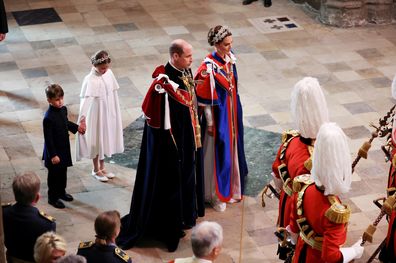 Catherine, Princess of Wales, Prince William, Prince of Wales, Princess Charlotte of Wales and Prince Louis of Wales during the Coronation of King Charles III and Queen Camilla on May 06, 2023 in London, England. 