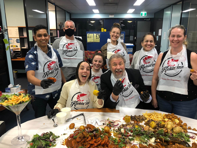 The Lifeline team enjoying a free lunch.