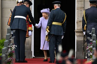     Queen Elizabeth II attends an Armed Forces Loyalty Act parade at the Palace of Holyroodhouse on June 28, 2022 in Edinburgh, UK.