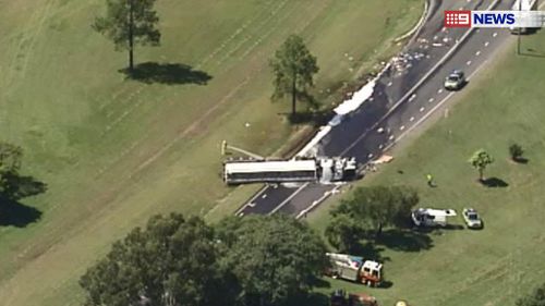A fuel tanker and van have collided shutting down a major highway in Queensland's south east. (9NEWS)