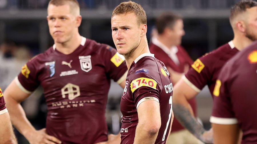Daly Cherry-Evans of the Maroons and team mates look dejected at full time after being thrashed by New South Wales in Origin II.