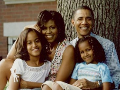 Michelle with husband Barack and daughters Sasha and Malia.  