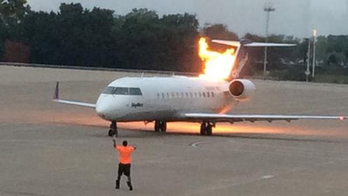 US flight goes up in flames moments before jetting down the runway