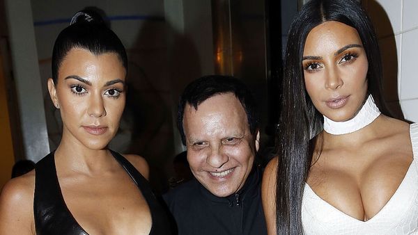 Kourtney and Kim Kardashian with Azzedine Alaia. Image: Getty
