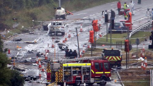 Emergency crews at the crash scene at Shoreham airport in 2015.