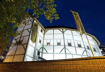 When did the first Globe Theatre, where Shakespeare was a shareholder, burn down?