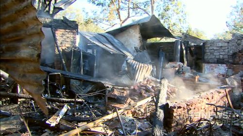 The fire completely destroyed the three-storey home and its entire contents. (9NEWS)