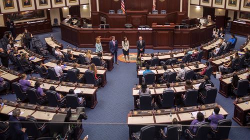 House Speaker Richard Corcoran speaks to student survivors from Marjory Stoneman Douglas High School In the House chambers at the Florida Capitol in Tallahassee. (AAP)