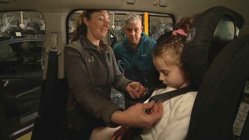 Danger of puffer jacket for children in a car seat.