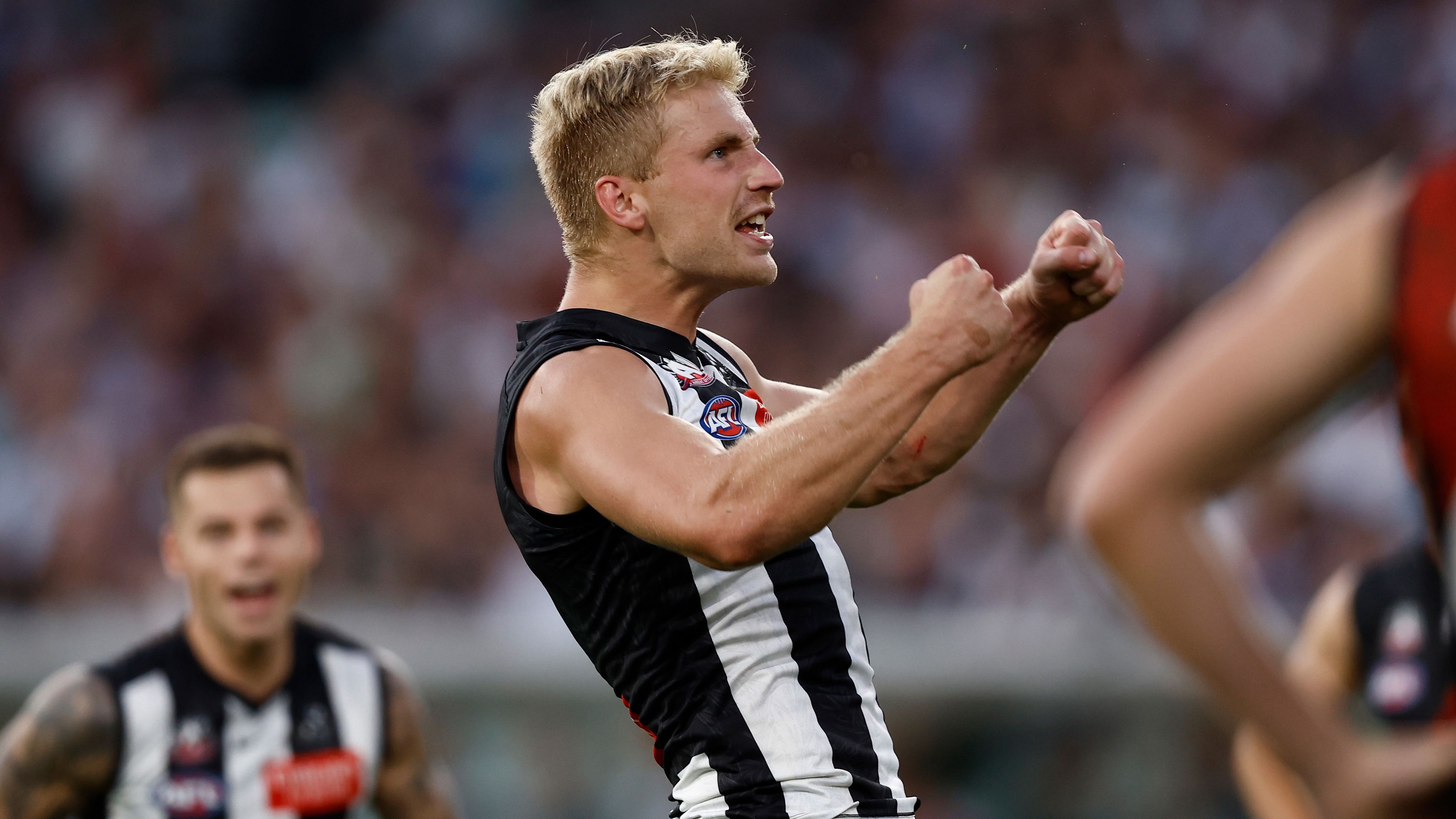 MELBOURNE, AUSTRALIA - APRIL 25: Billy Frampton of the Magpies celebrates a goal during the 2023 AFL Round 06 match between the Collingwood Magpies and the Essendon Bombers at the Melbourne Cricket Ground on April 25, 2023 in Melbourne, Australia. (Photo by Michael Willson/AFL Photos)