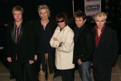 Simon Le Bon, John Taylor, Andy Taylor, Roger Taylor and Nick Rhodes of music group Duran Duran make an appearance at Virgin Records to sign copies of their new CD "Astronaut" October 12, 2004 in New York City. 